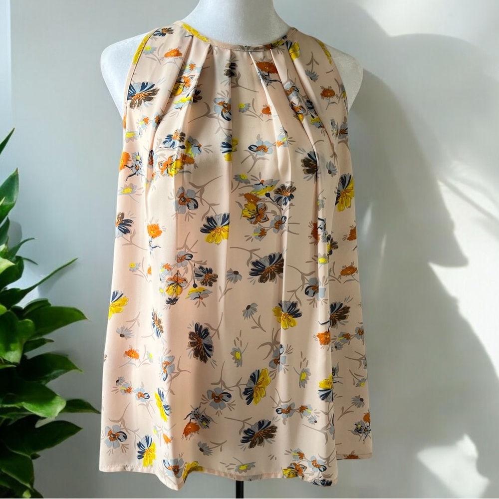 Ava Christine sleeveless floral flowy blouse with front pleating